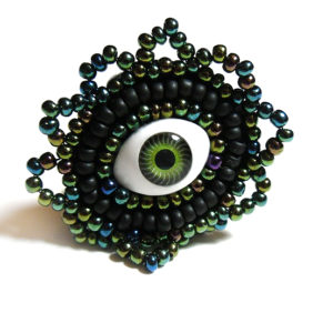 green evil eye ring