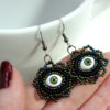 green evil eye earrings