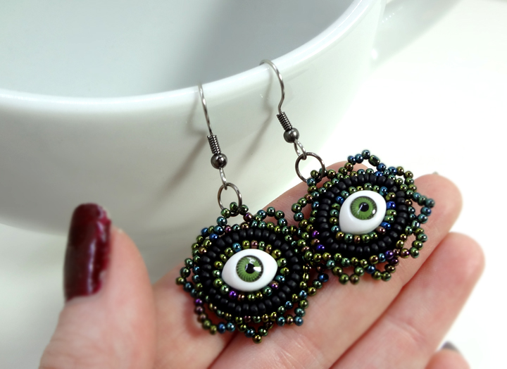 green evil eye earrings